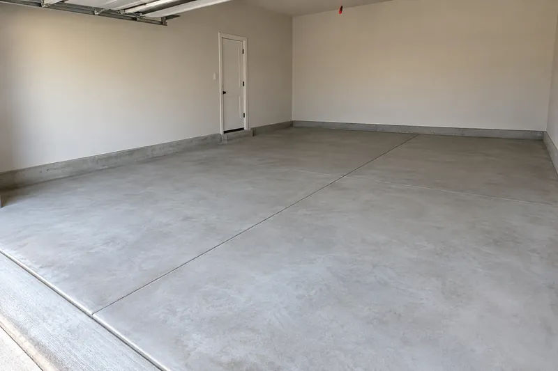 Clean new concrete floor in an empty garage