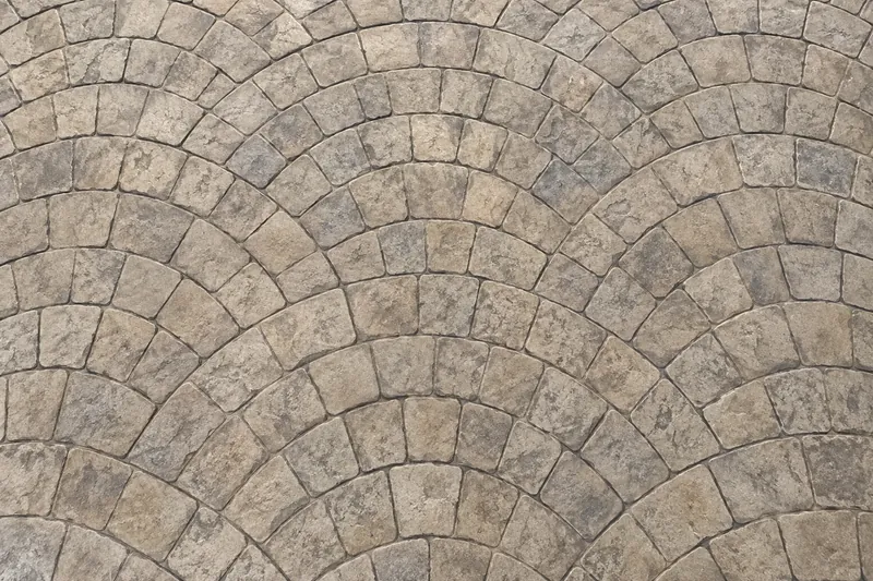 Stamped concrete in a fan cobblestone pattern