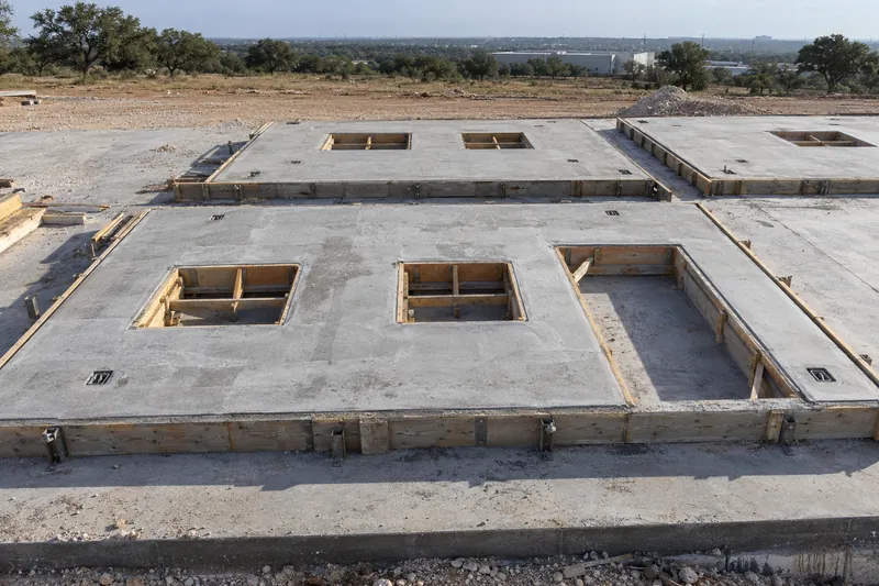 Tilt-wall panels formed and poured flat on the building slab
